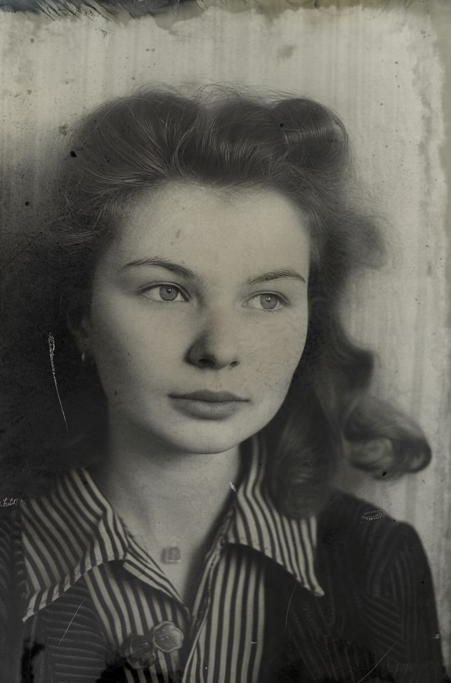 Old photo of young woman in a striped shirt, highlighting inherited family roots